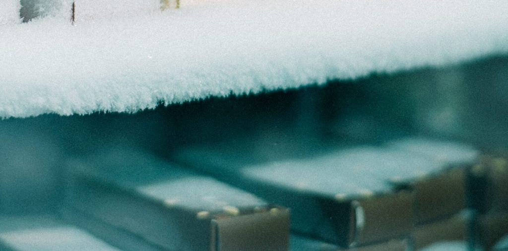 Frost building up on a cold surface inside a freezer