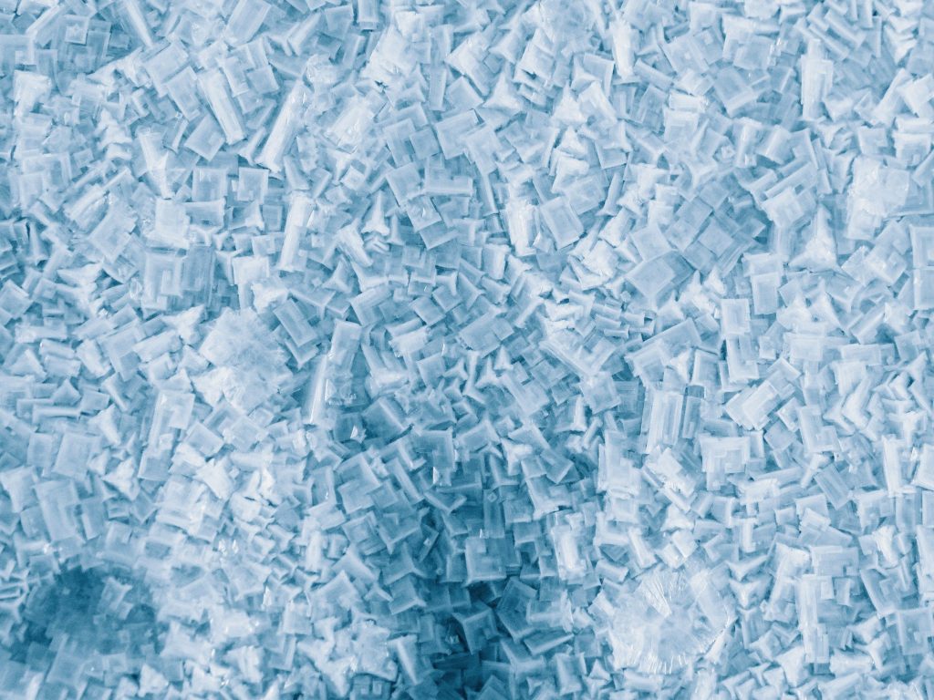 Pale blue shards of crushed ice packed together