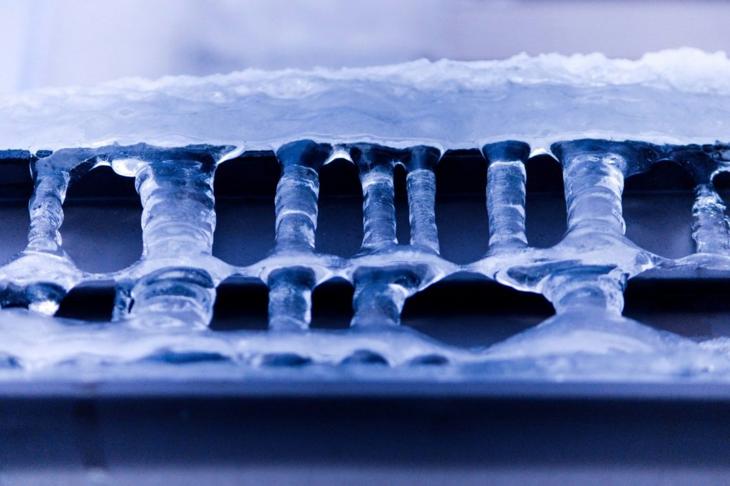 An evaporator fin pack completely blocked with ice