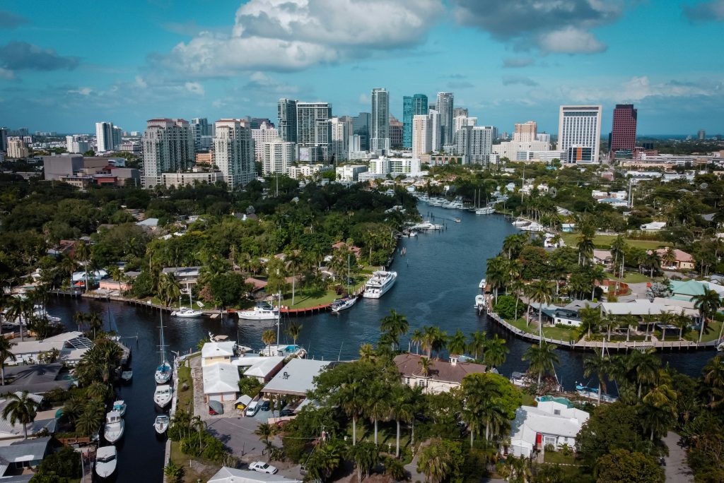 The Fort Lauderdale skyline above the residential canals, with boats moored behind the houses